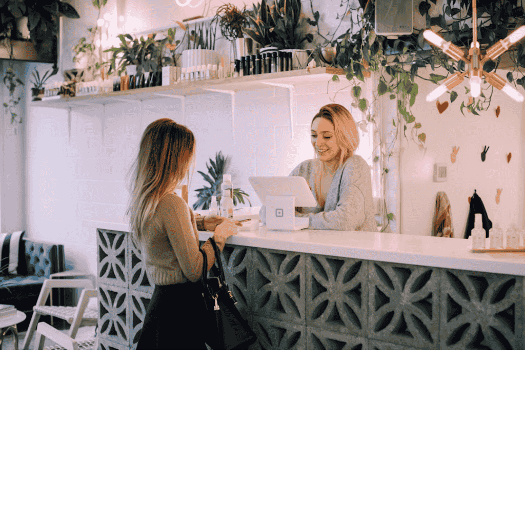 woman facing on white counter.